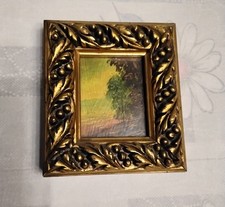 Piccolo dipinto d'epoca a olio con cornice dorata e lavorata