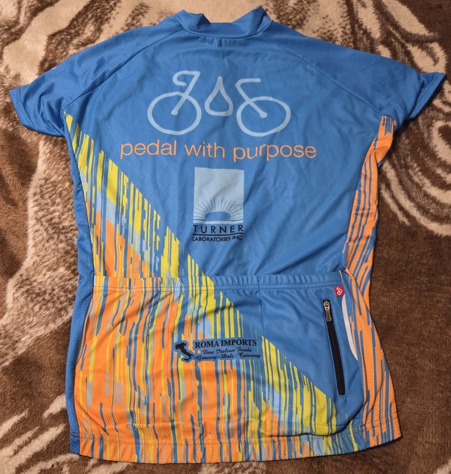 Camiseta de ciclismo para mujer talla L cremallera completa manga corta Jakroo.com geoméntrica usada en excelente estado Foto 2 de 4