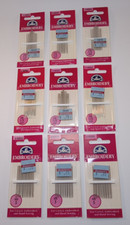 Nine packages of DMC embroidery needles, size 5 and assorted size 1 thru 5, NOS