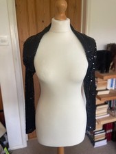 Ladies long sleeve, collared, black sequin bolero shrug size XS Used - good