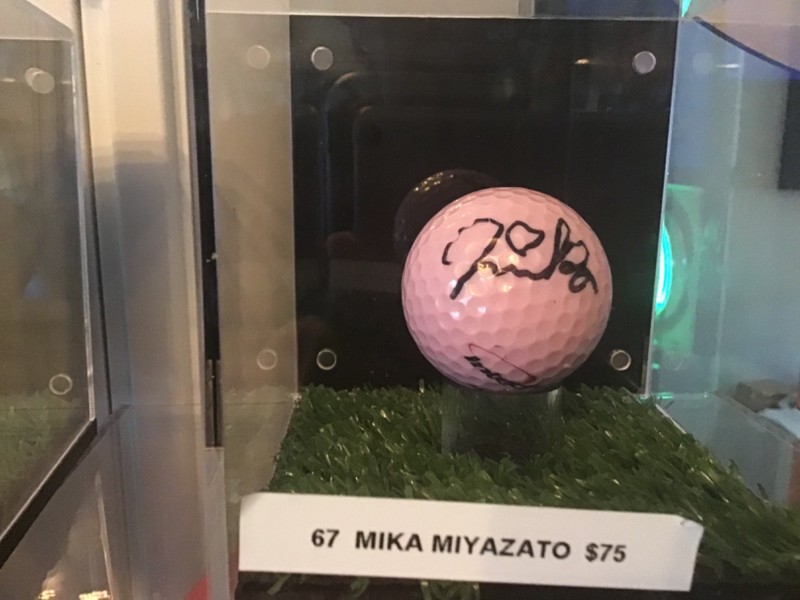 Autographed Mika Miyazato autographed golf ball in a case