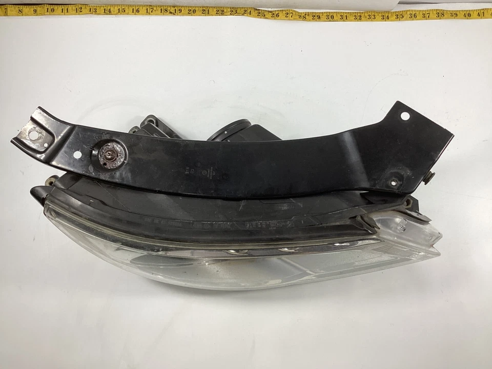 Faro delantero lateral pasajero Volkswagen Tiguan 2009-2011 5N1941032AC OEM. Foto 4 de 4