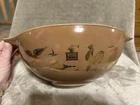 This is a vintage Pyrex Early American Cinderella mixing bowl
