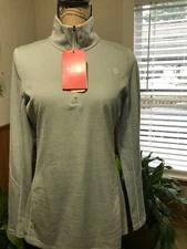 The north face Womens Tech Pullover 1/2 Zip.