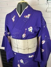 Vintage Japanese Purple Kimono with Playful Boy Motif