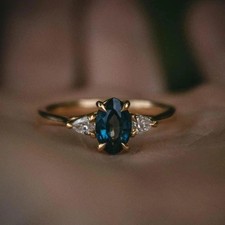 2Ct Oval Cut Simulated London Blue Topaz Three Stone Ring 14k Yellow Gold Plated