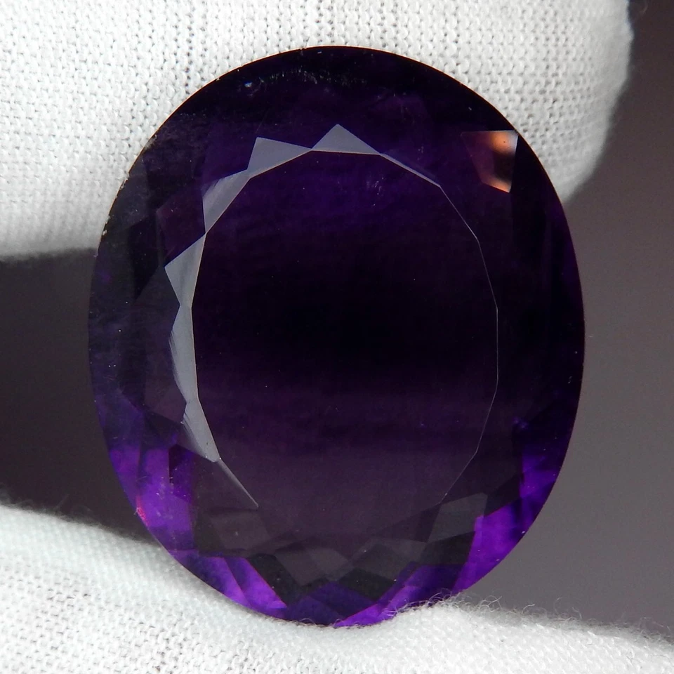 83,8 quilates cambio de color fluorita púrpura a rosa natural extraído sin calefacción facetado ovalado Foto 3 de 4