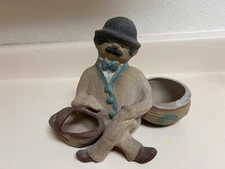 POPPETS BY POPPYTRAIL METLOX POTTERY SEATED MAN WITH POTS