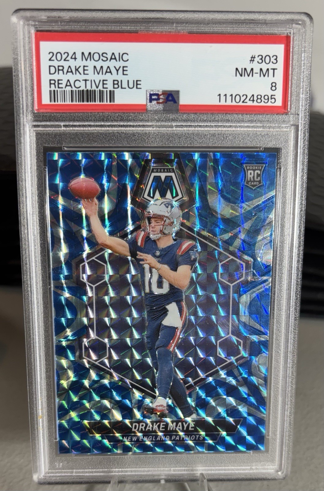 Panini 2024 Mosaic Drake Maye Rookie Reactive Blue Prizm #303 PSA 8 Patriots