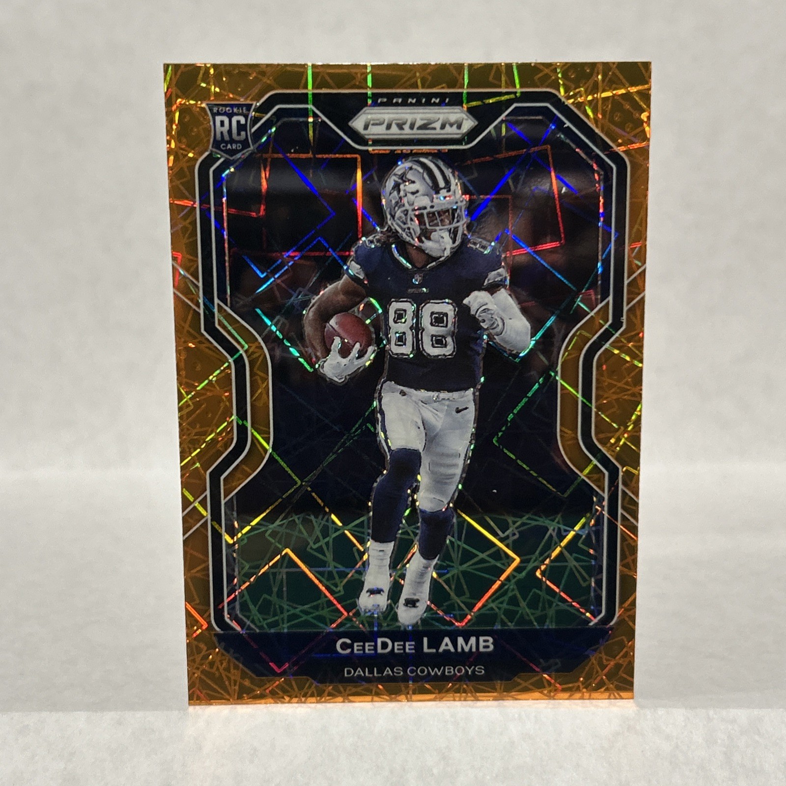 2020 Panini Prizm Football CeeDee Lamb Orange Lazer Prizm Rookie #334 Cowboys RC