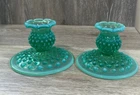 VINTAGE PAIR OF 2 FENTON DARK GREEN HOBNAIL CANDLESTICKS NICE GLOW URANIUM