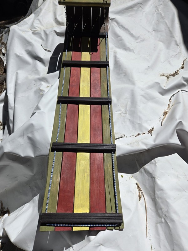 Wood tobaggon Red Yellow Black Green wall hanger 