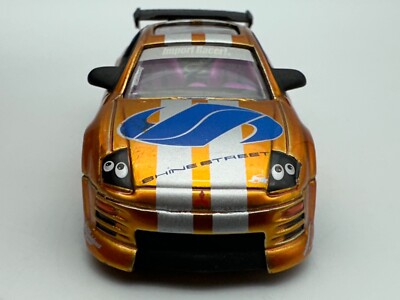 Jada Toys インポートレーサー 2003 三菱 エクリプス 1/18 2003 Mitsubishi Eclipse diecast model car 1:18 scale from