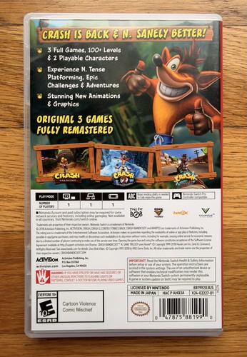 Black Switch case for Crash Bandicoot N Sane Trilogy with cover art of Crash, spikes, and colorful platform scenes.