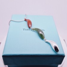 TIFFANY & CO JADE, WOOD AND STERLING SILVER FRANK GEHRY TRIPLE FISH NECKLACE