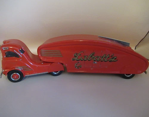 D.M.P. STUDIOS HAND BUILT 1947 LABATT'S STREAMLINER  SCALE 1:43