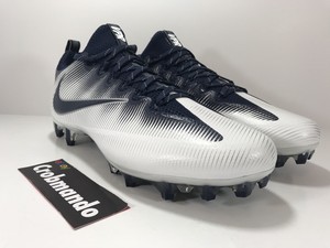 navy and white football cleats