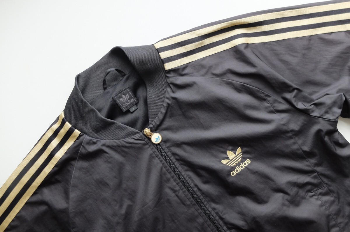 Vintage Adidas bomber jacket M black gold Trefoil 2006 VGC Vintage Adidas bomber jacket M black gold Trefoil 2006 VGC