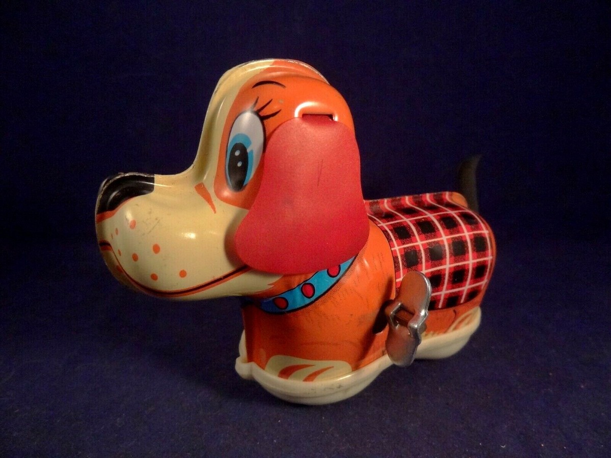 Vintagedco | Ancien jouet mécanique Cuki le chien en tôle de