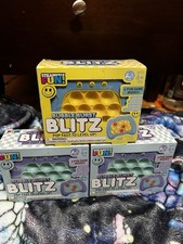 Strangely Fun Bubble Burst Blitz Electronic Game for Ages 6 Multiple Boxes
