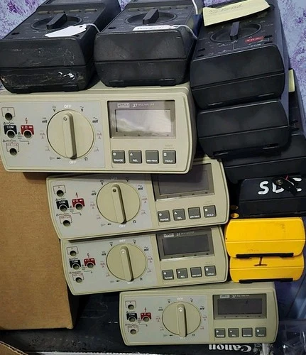 11 Lot Fluke Multimeters,  27, 27/FM, 37 - product listing photo