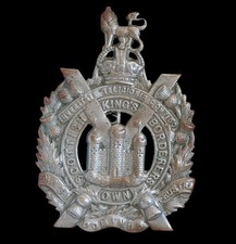 KOSB  King's Own Scottish Borderers Cap Badge, King's Crown, white metal.