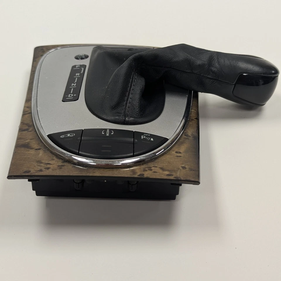 Mercedes Benz E55 AMG palanca de cambios envolvente 2116802436 cambio de marchas bisel OEM Foto 2 de 4