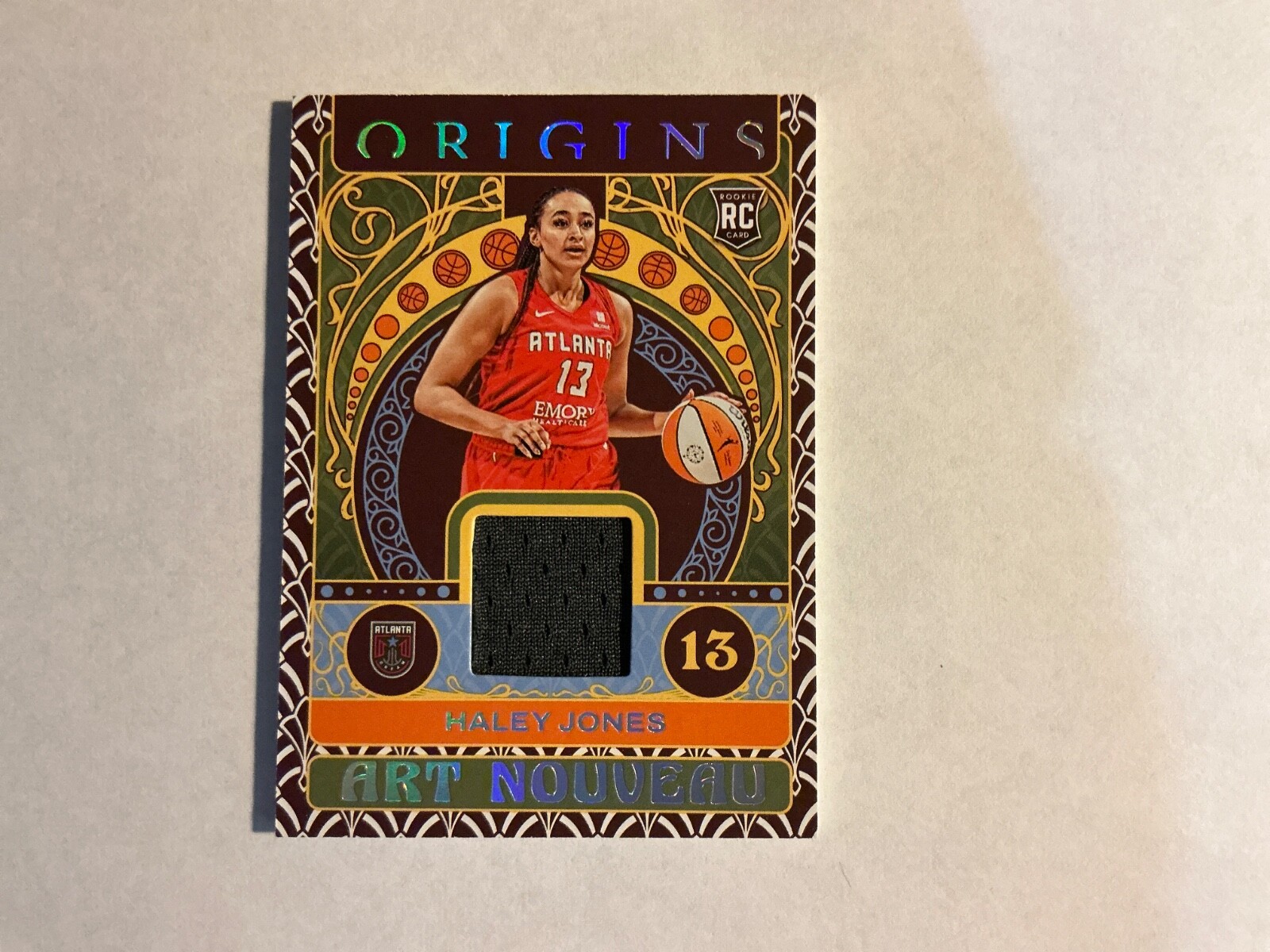 2023 Panini Origins WNBA - Art Nouveau Memorabilia Haley Jones #AN-HJN (MEM, RC)