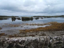 Photo 12x8 Skerries in Loch a' Chnuic Ardbeg/NR4146 An overcast afternoon c2009