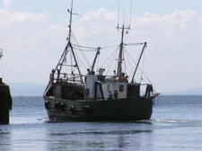 Photo 6x4 Trawler leaving Greencastle, Co. Donegal Greencastle/C6439 Jus c2005