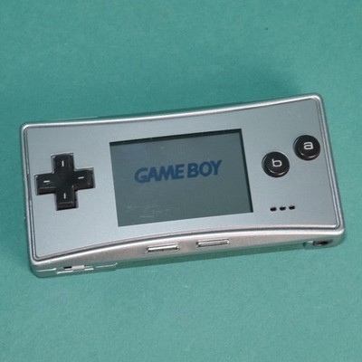 Nintendo Game Boy Micro silberfarbenes Handheld-System neuer Akku, funktionsfähig