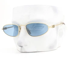 Miu Miu SMU A52 7VN-60O Sunglasses Polished Pale Gold Light Blue Tint with Case