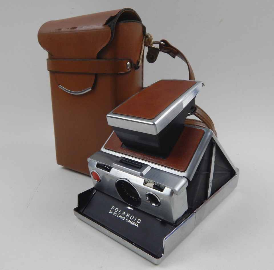 The SX-70 is the holy grail of Polaroid cameras — a brushed-metal folding masterpiece designed by Henry Dreyfuss that genuinely changed photography; even untested it's a stunning artifact.