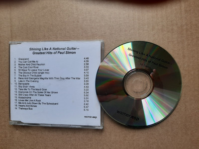 Paul Simon - THE GREATEST HITS / National Guitar (UK 19 TRK PROMO CD)