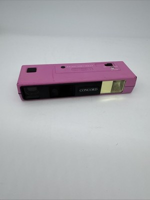 Vintage Concord 110CEF Neon Lites Pocket Camera Electronic Flash Pink UNTESTED