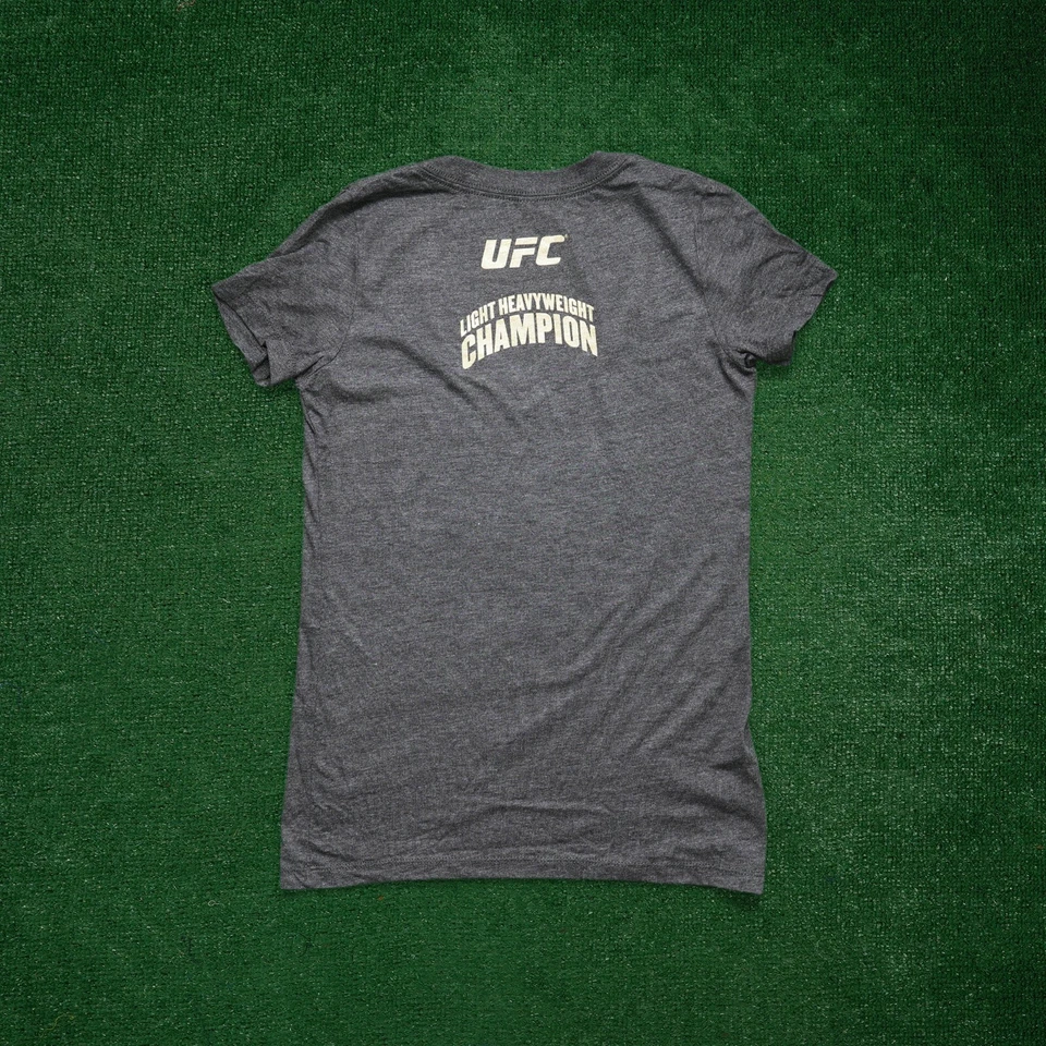 Camiseta para mujer Jon Jones Reebok UFC 182 Champ oficial negra Walkout Foto 2 de 4