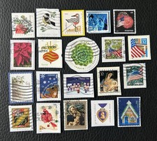 Lot de 20 timbres des USA années diverses - encore sur fragment - K90