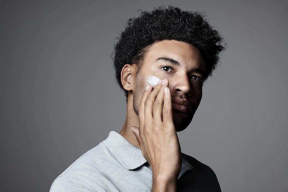 Crema hidratante facial Jack Black de doble función FPS 20 protector solar protección UVA/UVB 8,5 Foto 4 de 4