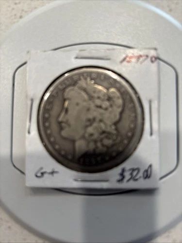 1897O Morgan. Grade Good? Nice old semi rare silver coin.