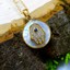 thumbnail 1 - Small Mother of Pearl Gold Crystal Hamsa Pendant .925 Silver Necklace