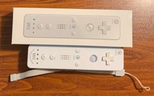 Nintendo Wii Remote in Box-Not sure if it works Free Shipping
