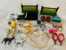 Mixed Lot Of Horse Accessories Horse Saddles Buckets Brushes Trophies Food Jumps