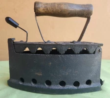 Ornate Design & an Animal Embossed on a Vintage Charcoal Iron