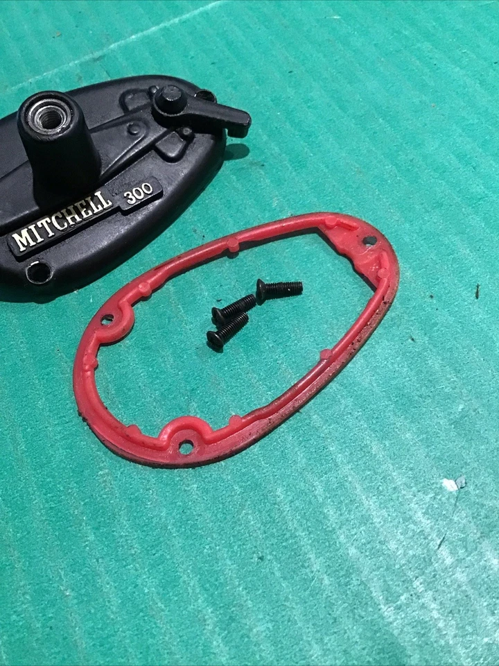 Placa lateral MITCHELL 300 con TORNILLOS DE JUNTA pieza de carrete giratorio (pre-García) Foto 3 de 4