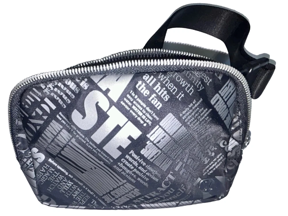 NWT Lululemon Everywhere Belt Bag 1L Black Silver Manifesto Print