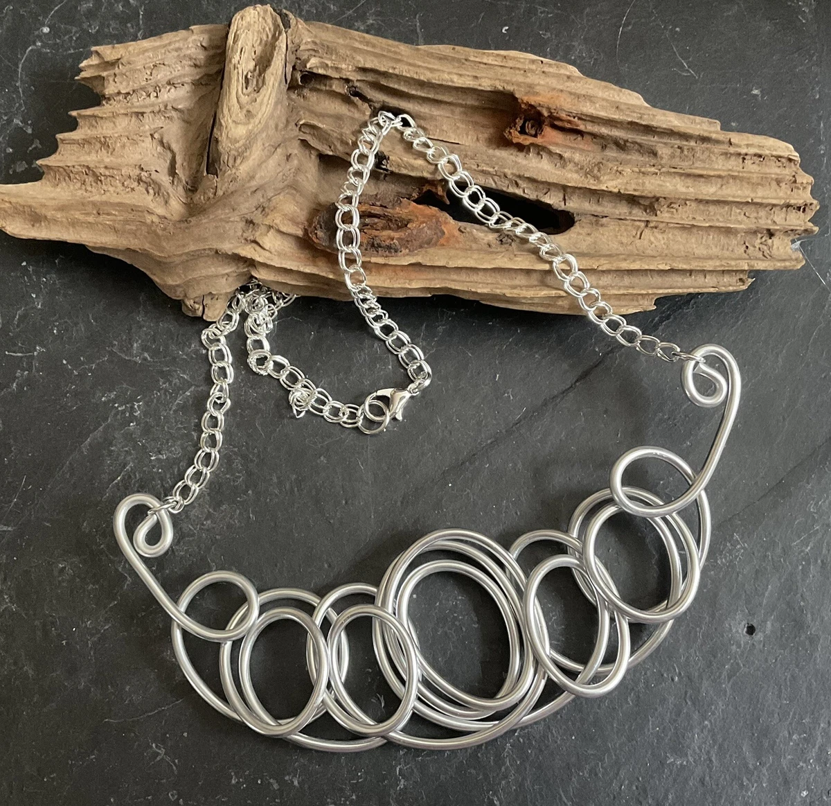 Silver coloured best sale necklaces