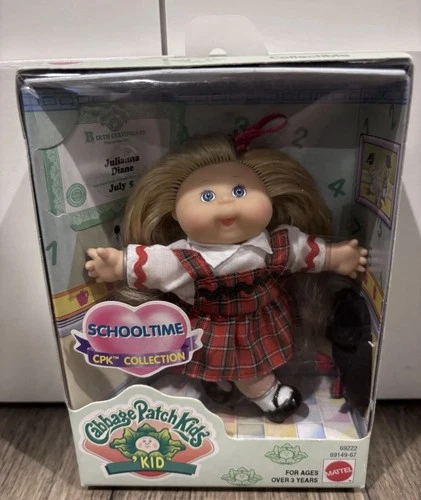 NIB 1995 Cabbage Patch Kids 'Kid Collectible doll in a "Schooltime" outfit