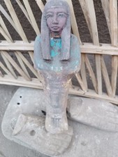 Ancient egyptian antique shabti figurine with sacred hieroglyphic funerary