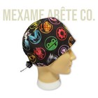 Black short hair men's scrub hat with colorful monster, gear, and symbol pattern, featuring a black cord and clasp.
