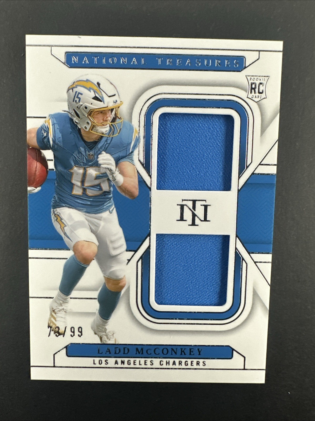 2024 National Treasures Ladd McConkey Rookie Dual Materials RC Jersey #73/99